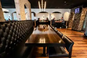 Brick Oven Clemmons dining area with guests enjoying a casual meal